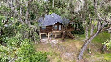 Tucked away at the end of a quiet street along the Withlacoochee - photo 2