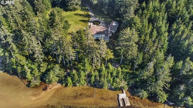 Tucked away on 20.29 lush waterfront acres with 1,358 feet of - photo 46