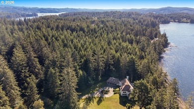 Tucked away on 20.29 lush waterfront acres with 1,358 feet of - photo 47
