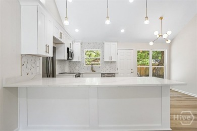 Price Improvement! Welcome to 2020 Cowan Ave, a stunningly - photo 9