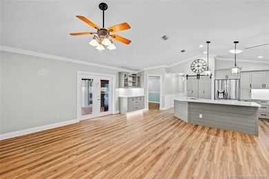 Welcome to Pinecrest Lakes! Situated on 1.1 acres, this unique - photo 15