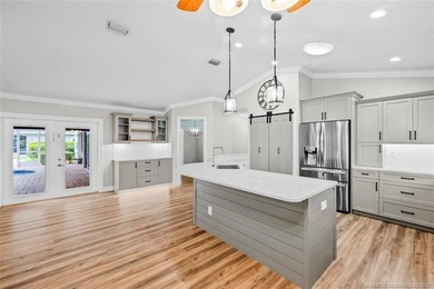 Welcome to Pinecrest Lakes! Situated on 1.1 acres, this unique - photo 17