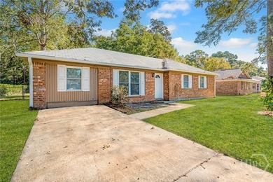 This beautiful updated and all-brick, 4 bed/2 bath home features - photo 1