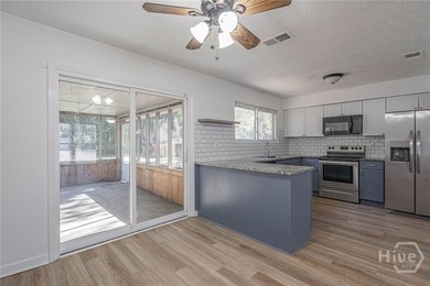 This beautiful updated and all-brick, 4 bed/2 bath home features - photo 8