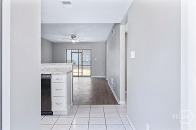 Welcome to this charming 2-bedroom, 2-bathroom condo in - photo 3