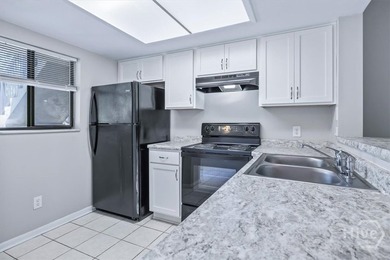Welcome to this charming 2-bedroom, 2-bathroom condo in - photo 4