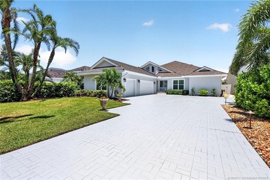 Nestled within the exclusive community of Sailfish Point, this - photo 2