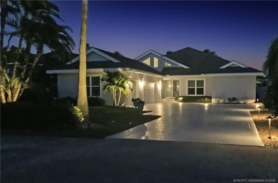 Nestled within the exclusive community of Sailfish Point, this - photo 3