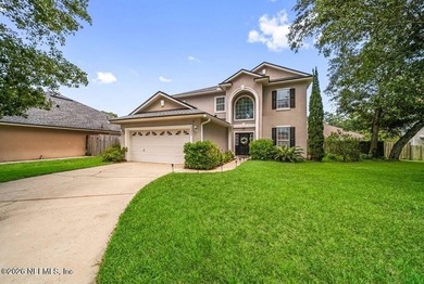 Welcome home to this meticulously maintained home in the coveted - photo 1