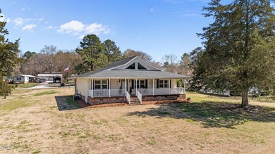 Custom-built home at Kerr Lake offering breathtaking water views - photo 1