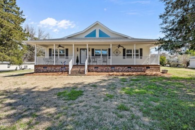 Custom-built home at Kerr Lake offering breathtaking water views - photo 2