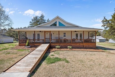 Custom-built home at Kerr Lake offering breathtaking water views - photo 4