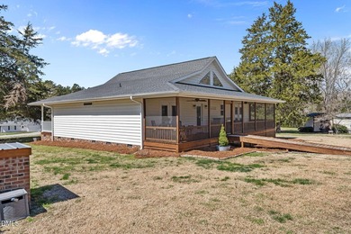 Custom-built home at Kerr Lake offering breathtaking water views - photo 6