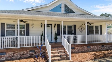 Custom-built home at Kerr Lake offering breathtaking water views - photo 7