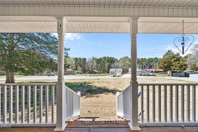 Custom-built home at Kerr Lake offering breathtaking water views - photo 8