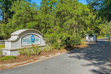 Private lot located in Satilla River Landing. Parcel 077B 111 is - photo 3