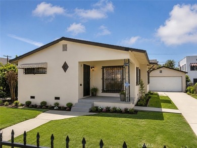 Walk into a open space living room with plenty of natural light - photo 2