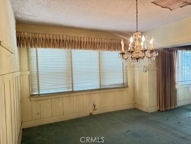 Walk into a open space living room with plenty of natural light - photo 9
