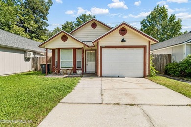 Just minutes from NAS Jacksonville, this private detached home - photo 1