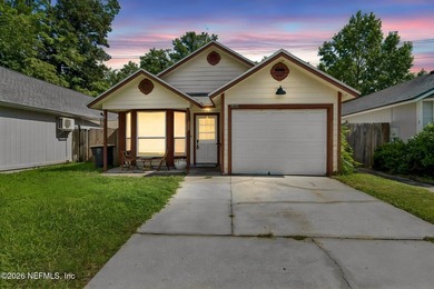 Just minutes from NAS Jacksonville, this private detached home - photo 2