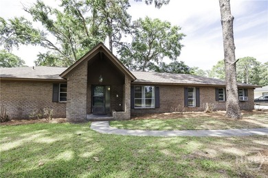 Welcome to 12 Jameswood Avenue, a charming all-brick - photo 2