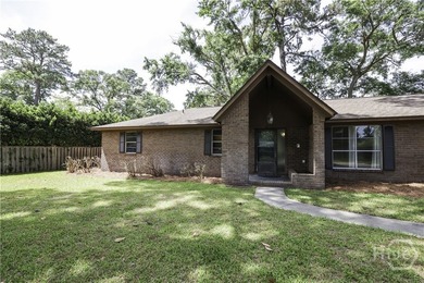 Welcome to 12 Jameswood Avenue, a charming all-brick - photo 4