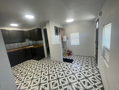 Step into a beautifully renovated 728 sq ft office building that - photo 11