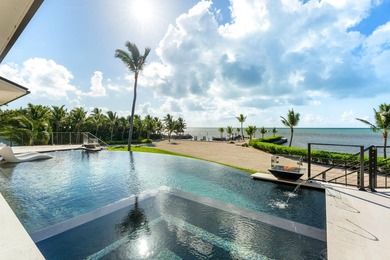 A private sanctuary of coastal sophistication, The Oasis offers - photo 29