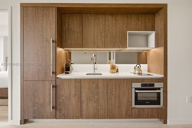Residence 301 at Domus Brickell Park is a fully furnished 860 SF - photo 6