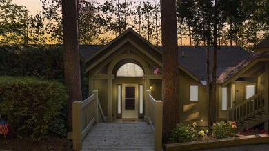 Perched among the whispering pines on Walloon Lake's desirable - photo 2