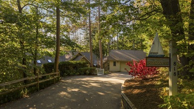Perched among the whispering pines on Walloon Lake's desirable - photo 6
