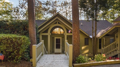 Perched among the whispering pines on Walloon Lake's desirable - photo 7