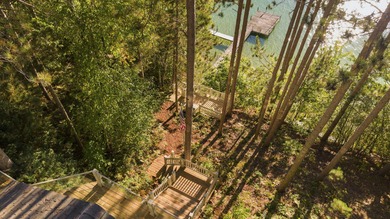Perched among the whispering pines on Walloon Lake's desirable - photo 8