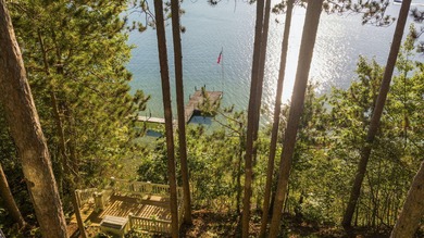 Perched among the whispering pines on Walloon Lake's desirable - photo 10