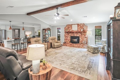 Built in 2022 and tucked away on 4.87+/- secluded acres, this - photo 8