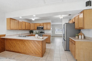 Welcome to this beautifully maintained 4-bedroom, 2-bath home in - photo 7