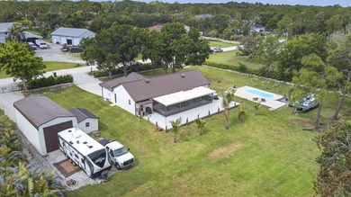 This nicely renovated home is move-in ready. Newly painted - photo 46
