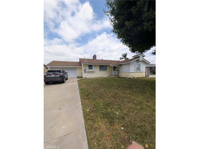 Set on a spacious lot, this four-bedroom, two-bath Garden Grove - photo 1