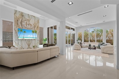 Completely reimagined contemporary coastal residence in the - photo 9
