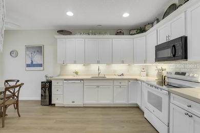 Live the Legends, first floor condo renovated with peaceful lake - photo 12