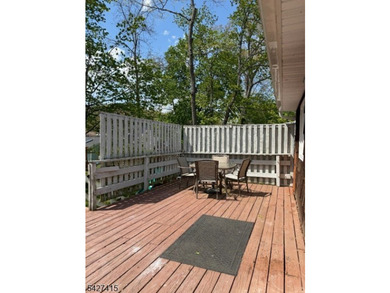 Welcome to this spacious four-bedroom ranch nestled in the - photo 18