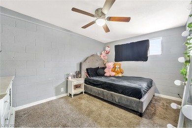 This single-story home offers three bedrooms and two full