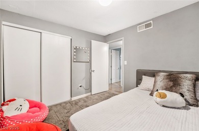 This single-story home offers three bedrooms and two full