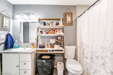 This single-story home offers three bedrooms and two full