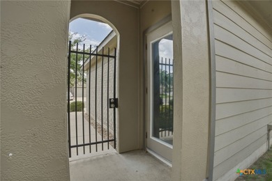 Welcome to this charming courtyard-style home in the highly - photo 25