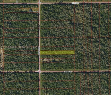 ALMOST 3 ACRES!!!! Set on a beautiful 2.81-acre corner lot, this - photo 1