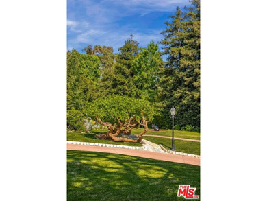 Located on one of the most desirable streets in all of Los - photo 6