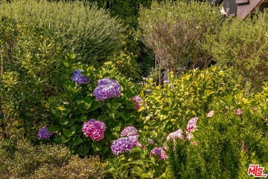 Located on one of the most desirable streets in all of Los - photo 8