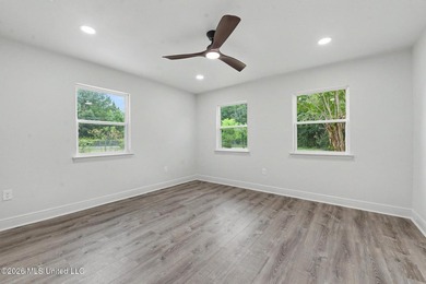 What a beautifully remodeled home on two lots with a metal - photo 18