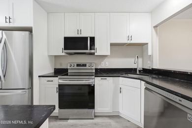 Welcome to this beautifully updated 2-bedroom, 2.5-bath home in - photo 8